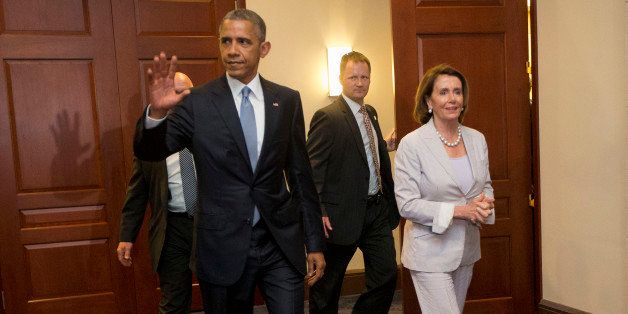 President Barack Obama and House Minority Leader Nancy Pelosi of Calif. leave meeting with House Democrats on Capitol Hill in Washington, Friday, June 12, 2015. The president made an 11th-hour appeal to dubious Democrats on Friday in a tense run-up to a House showdown on legislation to strengthen his hand in global trade talks. (AP Photo/Pablo Martinez Monsivais)