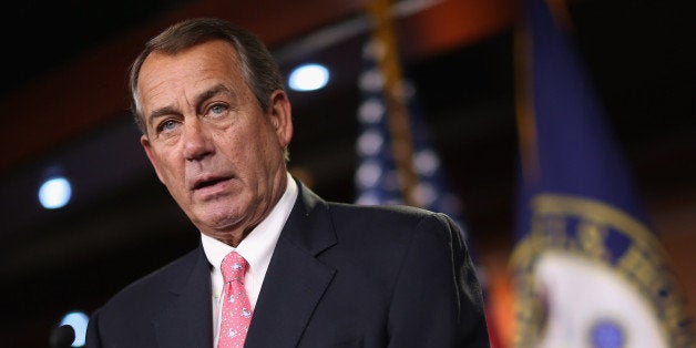 WASHINGTON, DC - JUNE 25: Speaker of the House John Boehner (R-OH) (R) holds his weekly news conference at the U.S. Capitol June 25, 2015 in Washington, DC. Boehner said that if the Supreme Court had handed down a decision against the Affordable Care Act tax credits that Republicans had a plan to deal with the results. (Photo by Chip Somodevilla/Getty Images)