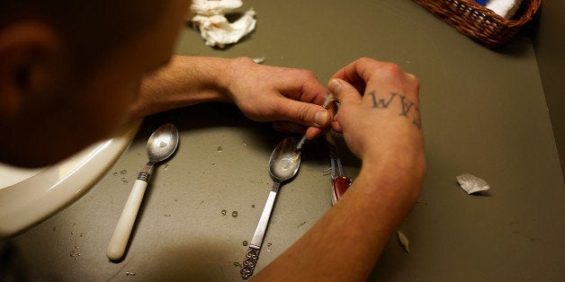 ST. JOHNSBURY, VT - FEBRUARY 06: Drugs are prepared to shoot intravenously by a user addicted to heroin on February 6, 2014 in St. Johnsbury Vermont. Vermont Governor Peter Shumlin recently devoted his entire State of the State speech to the scourge of heroin. Heroin and other opiates have begun to devastate many communities in the Northeast and Midwest leading to a surge in fatal overdoses in a number of states. As prescription painkillers, such as the synthetic opiate OxyContin, become increasingly expensive and regulated, more and more Americans are turning to heroin to fight pain or to get high. Heroin, which has experienced a surge in production in places such as Afghanistan and parts of Central America, has a relatively inexpensive street price and provides a more powerful affect on the user. New York City police are currently investigating the death of the actor Philip Seymour Hoffman who was found dead last Sunday with a needle in his arm. (Photo by Spencer Platt/Getty Images)