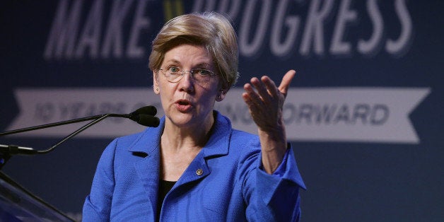 WASHINGTON, DC - JULY 16: U.S. Sen. Elizabeth Warren (D-MA) addresses the 10th annual Make Progress National Summit at the Walter E. Washington Convention Center July 16, 2015 in Washington, DC. Hundreds of youth leaders, student activists, and organizers gathered for the convention, which is organized by Generation Progress, the youth engagement arm of the liberal think tank Center for American Progress. (Photo by Chip Somodevilla/Getty Images)