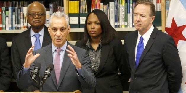 Chicago mayor Rahm Emanuel, second from left, responds to a question about the Chicago Public Schools after announcing a news leadership team for CPS during a news conference Thursday, July 16, 2015, in Chicago. The new team from left are, Frank Clark, president of the Chicago Board of Education, Emanuel, Janice Jackson, Chief Education Officer, and Forrest Claypool, CEO of Chicago Public Schools. (AP Photo/Charles Rex Arbogast)