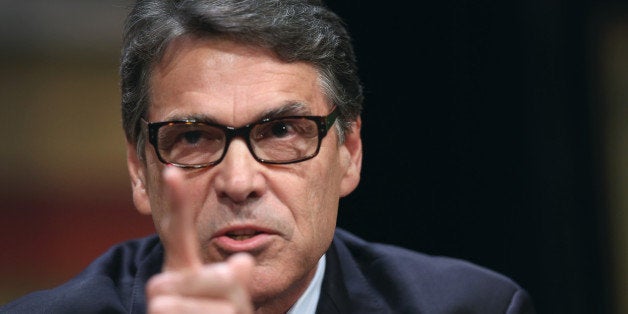 AMES, IA - JULY 18: Republican presidential candidate and former Texas Governor Rick Perry fields questions at The Family Leadership Summit at Stephens Auditorium on July 18, 2015 in Ames, Iowa. According to the organizers the purpose of The Family Leadership Summit is to inspire, motivate, and educate conservatives. (Photo by Scott Olson/Getty Images)