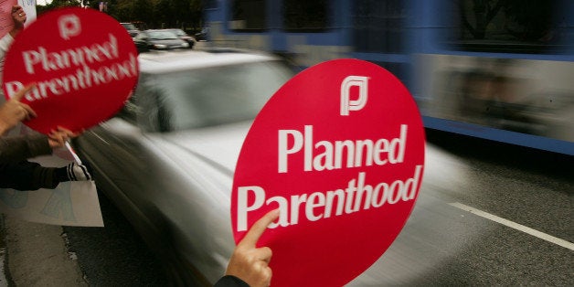 LOS ANGELES, CA - JANUARY 22: Pro-choice supporters and members of Planned Parenthood rally to mark the 35th anniversary of the Roe v. Wade decision legalizing abortion, outside the Federal Building January 22, 2008 in the Los Angeles area community of Westwood, California. According to a CNN/Opinion Research survey last October, 36 percent of Americans support legal abortion in most or all circumstances, 40 percent believe abortion should be available in a few circumstances such as to save the mother's life, and 22 percent believe abortion should never be legal. Those numbers remain almost unchanged over the past 15 years. Passions remain high on both sides of the issue. (Photo by David McNew/Getty Images)