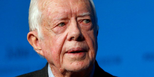 Former President Jimmy Carter speaks during a forum at the John F. Kennedy Presidential Library and Museum in Boston, Thursday, Nov. 20, 2014. Among other topics, Carter discussed his new book, "A Call to Action: Women, Religion, Violence, and Power." (AP Photo/Elise Amendola)