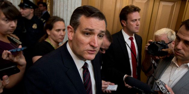 Sen. Ted Cruz, R-Texas, speaks to reporters following a rare Sunday Senate session on Capitol Hill in Washington, Sunday, July 26, 2015. Senior Senate Republicans lined up Sunday to rebuke Cruz for attacking Majority Leader Mitch McConnell, an extraordinary display of intraparty division played out live on the Senate floor. (AP Photo/Manuel Balce Ceneta)