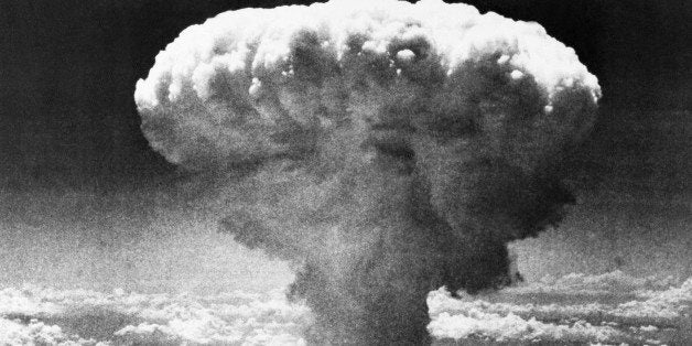 FILE - In this Aug. 9, 1945 file photo, a mushroom cloud rises moments after the atomic bomb was dropped on Nagasaki, souther
