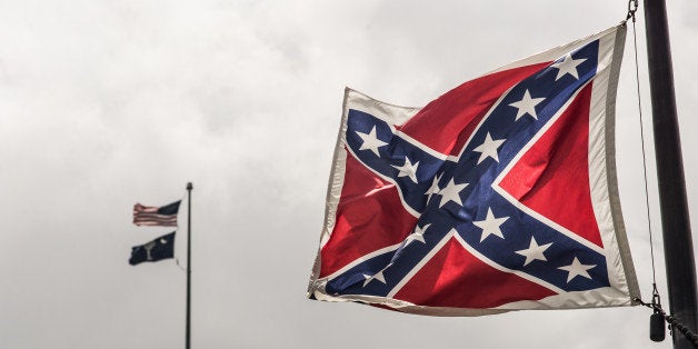 COLUMBIA, SC - JULY 8: The Confederate battle flag flies at the South Carolina state house grounds July 8, 2015 in Columbia, South Carolina. South Carolina lawmakers will continue the debate today on whether to remove the flag from the capitol grounds. (Photo by Sean Rayford/Getty Images)