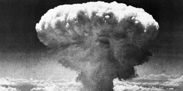 FILE - In this Aug. 9, 1945 file photo, a mushroom cloud rises moments after the atomic bomb was dropped on Nagasaki, souther