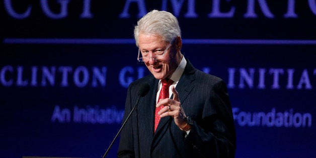 Former President Bill Clinton speaks to attendees during a session of the annual gathering of the Clinton Global Initiative A