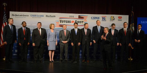 MANCHESTER, NH - AUGUST 3: Saint Anselm College President Steven R. DiSalvo introduces (L-R) former Florida Gov. Jeb Bush, Dr. Ben Carson, New Jersey Gov. Chris Christie, former CEO Hewlett-Packard Carly Fiorina, U.S. Senator Lindsey Graham (SC), Louisiana Gov. Bobby Jindal, Ohio Gov. John Kasich, former New York Gov. George Pataki, former Texas Gov. Rick Perry, former U.S. Senator Rick Santorum (PA), Wisconsin Gov. Scott Walker stand on the stage prior to the Voters First Presidential Forum at Saint Anselm College August 3, 2015 in Manchester, New Hampshire. The forum was organized by the New Hampshire Union Leader newspaper and C-SPAN in response to the Fox News debate later this week that will limit the candidates to the top 10 Republicans based on nationwide polls. (Photo by Darren McCollester/Getty Images)