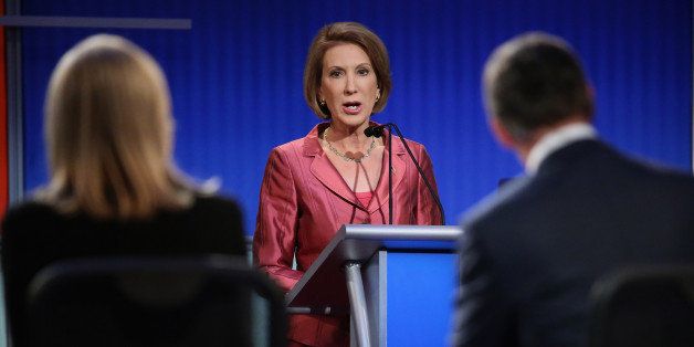 CLEVELAND, OH - AUGUST 06: Republican presidential candidate Carly Fiorina participates in a presidential pre-debate forum hosted by FOX News and Facebook at the Quicken Loans Arena August 6, 2015 in Cleveland, Ohio. Fiorina and six other GOP candidates were selected to participate in the forum based on their rank in an average of the five most recent national political polls. (Photo by Chip Somodevilla/Getty Images)