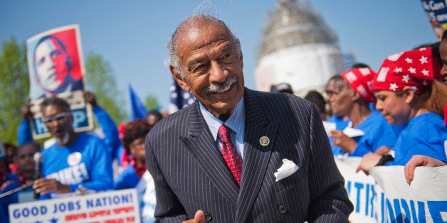 UNITED STATES - APRIL 22: Rep. John Conyers, D-Mich., attends a rally with striking federal workers on the East Front of the Capitol, April 22, 2015, to call on President Obama to sign the Model Employer Executive Order that would raise the minimum wage to at least $15 an hour. (Photo By Tom Williams/CQ Roll Call)