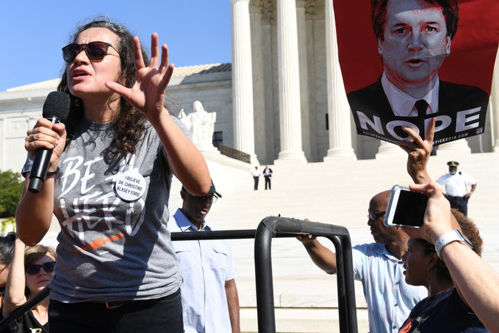 Ana Maria Archila addresses anti-Kavanaugh demonstrators outside the U.S. Supreme Court on Thursday.