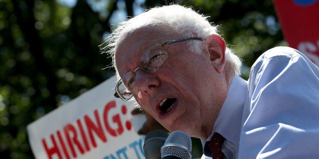 WASHINGTON, DC - JULY 22: Democratic presidential candidate and U.S. Sen. Bernie Sanders (I-VT) speaks at a Capitol Hill rally to introduce legislation to raise the federal minimum wage to $15 an hour July 22, 2015 in Washington, DC. Sanders said the U.S. federal government is the largest employer of minimum wage workers in the United States. (Photo by Win McNamee/Getty Images)