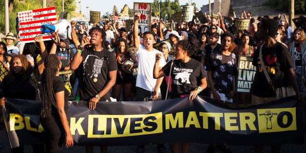 TORONTO, ON- JULY 27 - Uranranebi Agbeyegbe screams into a microphone during a Black Lives Matter protest that marched from Gilbert Avenue to Allen Road on Eglinton Avenue. The protest shut down the southbound Allen Road for around 30 minutes, causing traffic to reverse and exit through Lawrence Avenue. (Melissa Renwick/Toronto Star via Getty Images)