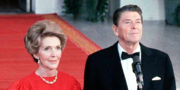 WASHINGTON - MAY 7: (NO U.S. TABLOID SALES) U.S. President Ronald Reagan and wife Nancy greeting the press at the North Portico of the White House May 7, 1981 in Washington, DC. (Photo by David Hume Kennerly/Getty Images)