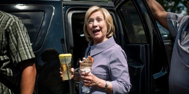 DES MOINES, IOWA - AUGUST 15: Former Secretary of State Hillary Clinton attends the Iowa State Fair escorted by former Iowa Senator Tom Harkin in Des Moines, Iowa, on Saturday, August 15, 2015. (Photo by Melina Mara/The Washington Post via Getty Images)