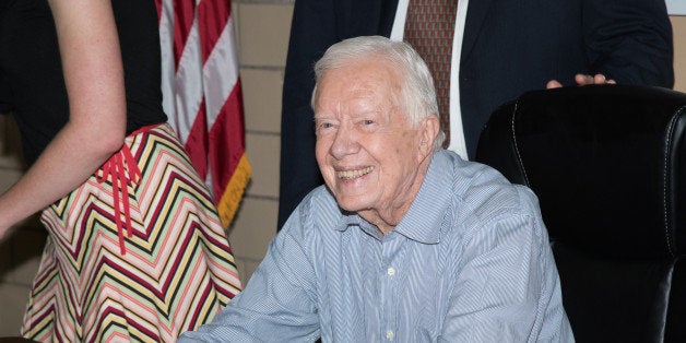 RIDGEWOOD, NJ - JULY 08: Former President of the United States Jimmy Carter signs copies of 'A Full Life Reflections At Ninety' at Bookends Bookstore on July 8, 2015 in Ridgewood, New Jersey. (Photo by Dave Kotinsky/Getty Images)