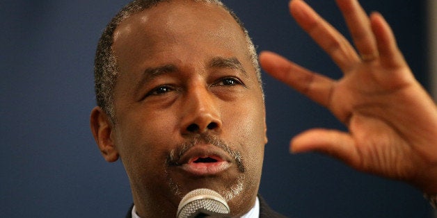 DES MOINES, IA - AUGUST 16: Republican presidential hopeful Ben Carson (C) speaks during church services at Maple Street Mis