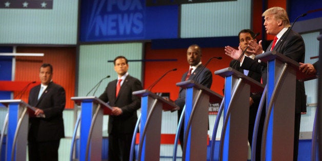 Republican presidential candidate Donald Trump speaks as from left, Chris Christie, Marco Rubio, Ben Carson, Scott Walker listen during the first Republican presidential debate at the Quicken Loans Arena Thursday, Aug. 6, 2015, in Cleveland. (AP Photo/Andrew Harnik)