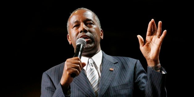 Republican presidential candidate Dr. Ben Carson delivers a speech at a rally to supporters Tuesday, Aug. 18, 2015, in Phoenix. (AP Photo/Ross D. Franklin)