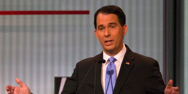 Republican presidential candidate and Wisconsin Gov. Scott Walker speaks during the first Republican presidential debate at the Quicken Loans Arena Thursday, Aug. 6, 2015, in Cleveland. (AP Photo/John Minchillo)