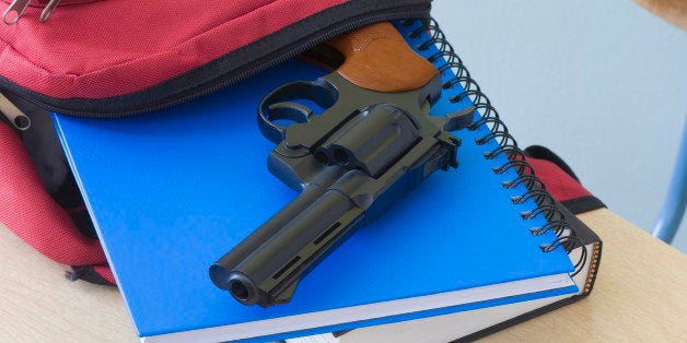 Backpack, notebooks, and handgun