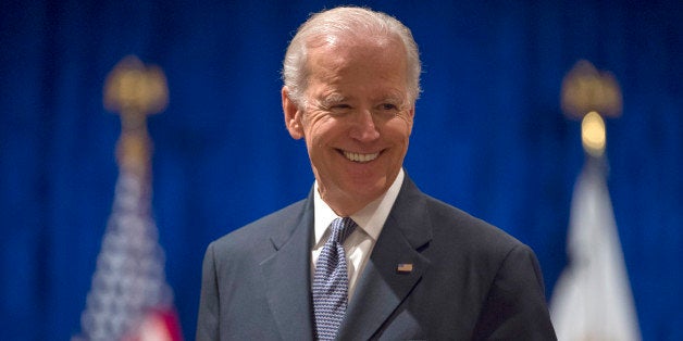 Vice President Joe Biden smiles as he arrives to speak to the University of Notre Dame Leaders Symposium, Tuesday, April 14,