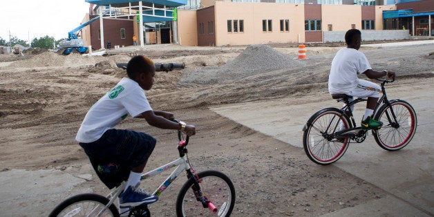 NEW ORLEANS, LA - JULY 22: A new high school is being built in the Lower Ninth Ward, on July 22, 2015 in New Orleans, Louisiana. It's been ten years since hurricane Katrina devastated neighborhoods throughout the city. This area was wiped out when this levee broke after the storm. Schools are just one of many things being improved post Katrina. While many homes have been rebuilt, there are still many empty lots where homes used to stand. (Photo by Melanie Stetson Freeman/The Christian Science Monitor via Getty Images