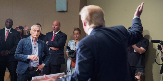 DUBUQUE, IA - AUGUST 25: Republican presidential candidate Donald Trump fields a question from Univision and Fusion anchor Jorge Ramos during a press conference held before his campaign event at the Grand River Center on August 25, 2015 in Dubuque, Iowa. Earlier in the press conference Trump had Ramos removed from the room when he failed to yield when Trump wanted to take a question from a different reporter. Trump leads most polls in the race for the Republican presidential nomination. (Photo by Scott Olson/Getty Images)