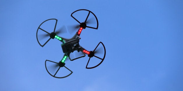 OLD BETHPAGE, NY - AUGUST 30: A drone is flown for recreational purposes in the sky above Old Bethpage, New York on August 3