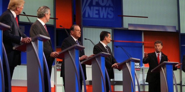 Republican presidential candidates from left, Donald Trump, Jeb Bush, Mike Huckabee, Ted Cruz and Rand Paul take the stage fo