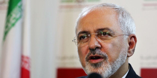 FILE - A Wednesday, Aug. 12, 2015 photo from files showing Iranian Foreign Minister Mohammad Javad Zarif, during a press conference at the Lebanese foreign ministry in Beirut, Lebanon. An unusual secret agreement with a U.N. agency will allow Iran to use its own experts to inspect a site allegedly used to develop nuclear arms, according to a document seen by The Associated Press. (AP Photo/Bilal Hussein, File)