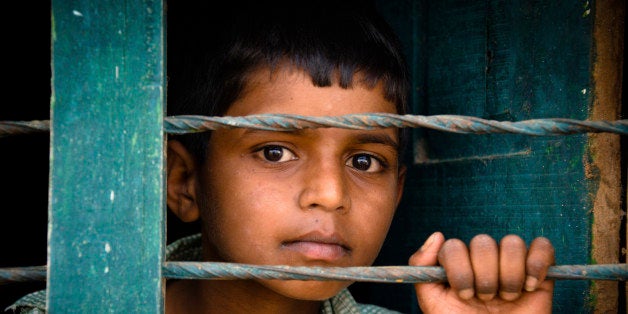 Child behind the bars