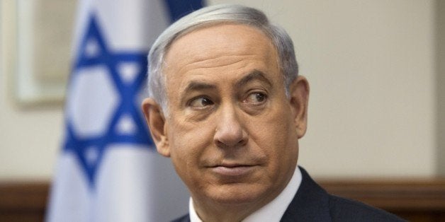 Israel's Prime Minister Benjamin Netanyahu chairs the weekly cabinet meeting at his office in Jerusalem on June 7, 2015. AFP PHOTO / POOL / SEBASTIAN SCHEINER (Photo credit should read SEBASTIAN SCHEINER/AFP/Getty Images)