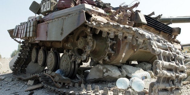 A picture taken on September 6, 2014 outskirts the key southeastern port city of Mariupol shows a destroyed tank the day afte