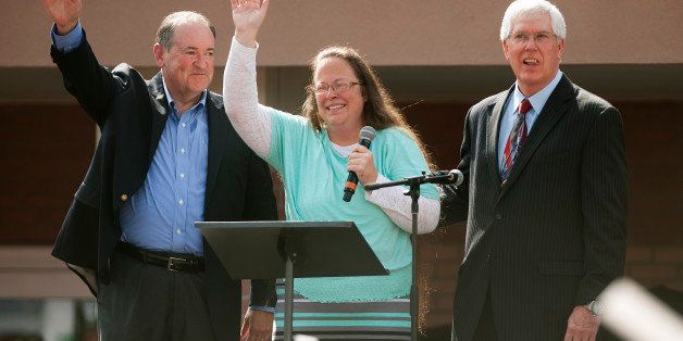 GRAYSON, KY - SEPTEMBER 8: Rowan County Clerk of Courts Kim Davis stands with her attorney Mat Staver (R) and Republican presidential candidate Mike Huckabee (L) in front of the Carter County Detention Center on September 8, 2015 in Grayson, Kentucky. Davis was ordered to jail last week for contempt of court after refusing a court order to issue marriage licenses to same-sex couples. (Photo by Ty Wright/Getty Images)