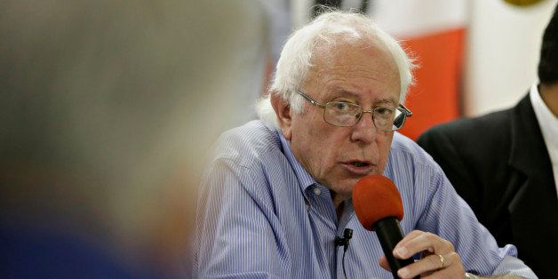Senator Bernie Sanders, an independent from Vermont and 2016 Democratic presidential candidate, speaks to a primarily Latino audience during a campaign stop at the Muscatine Boxing Club in Muscatine, Iowa, U.S., on Friday, Sept. 4, 2015. Sanders said yesterday he doesn't have a foreign policy section on his website's issues page because one of his campaign's problems is that 'our support is growing faster than our political infrastructure.' Photographer: Daniel Acker/Bloomberg via Getty Images 