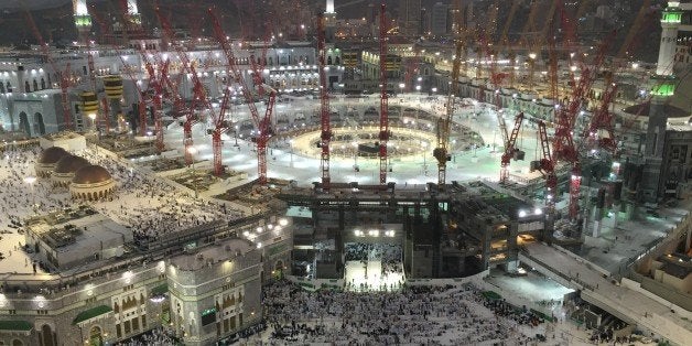 MECCA, SAUDI ARABIA - SEPTEMBER 12: Muslim pilgrims worship around the Kaaba at the Masjid al-Haram (Grand Mosque) as expansion and construction works continue ahead of the start of the annual hajj pilgrimage in Mecca, Saudi Arabia on September 12, 2015. According to the Saudi authorities, a total of 107 people were killed on Friday afternoon when a massive crane collapsed in Meccas Grand Mosque, Islam's holiest site, which at the time had been teeming with worshippers performing the annual Hajj pilgrimage. (Photo by Ozkan Bilgin/Anadolu Agency/Getty Images)