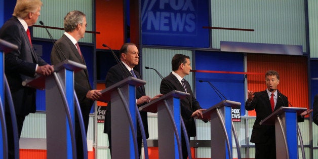 Republican presidential candidates from left, Donald Trump, Jeb Bush, Mike Huckabee, Ted Cruz and Rand Paul take the stage fo