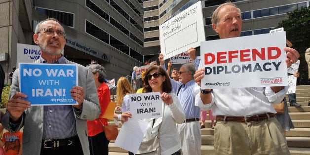 BALTIMORE, MD - AUGUST 26: MoveOn members and anti-war activists demonstrate outside the office of Sen. Ben Cardin (D-Md.), urging Cardin to support the deal to prevent Iran from acquiring a nuclear weapon on August 26, 2015 in Baltimore, Maryland. (Photo by Larry French/Getty Images for MoveOn.org)