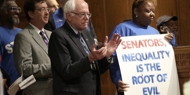 WASHINGTON, DC - SEPTEMBER 22: Democratic presidential candidate Sen. Bernie Sanders (I-VT) speaks at an event held by striking U.S. Capitol workers on Capitol Hill September 22, 2015 in Washington, DC. The U.S. Capitol workers held a religious procession to urge a minimum wage of $15 and to welcome Pope Francis before the Pope meets with and addresses members of Congress on Thursday. (Photo by Win McNamee/Getty Images)