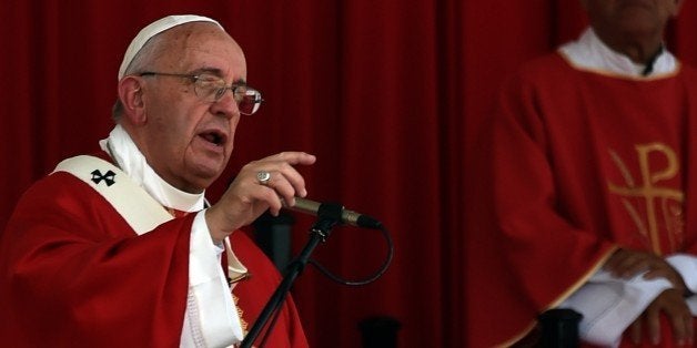 Pope Francis gives a morning mass at the Calixto Garcia square in Holguin, in eastern Cuba, on September 21, 2015. Holguin, a cradle of Catholic faith on the island and also the home region of communist leaders Fidel and Raul Castro, is the only stop on the pope's eight-day, six-city tour of Cuba and the United States that has never received a papal visit. AFP PHOTO / RODRIGO ARANGUA (Photo credit should read RODRIGO ARANGUA/AFP/Getty Images)