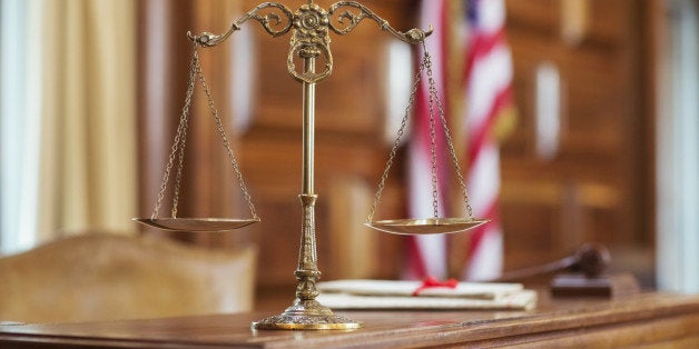 Scales of justice on the judgeÃs bench