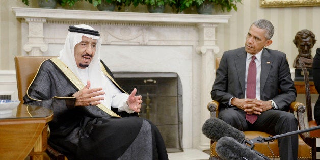 U.S. President Barack Obama, right, listens as King Salman bin Abdulaziz Al Saud of Saudi Arabia speaks during a meeting in the Oval Office at the White House in Washington, D.C., U.S., on Friday, Sept. 4, 2015. 'This is obviously a challenging time in world affairs, particularly in the Middle East,' Obama told reporters, mentioning energy near the end of a list of topics that he and Salman would address. Photographer: Olivier Douliery/Bloomberg via Getty Images