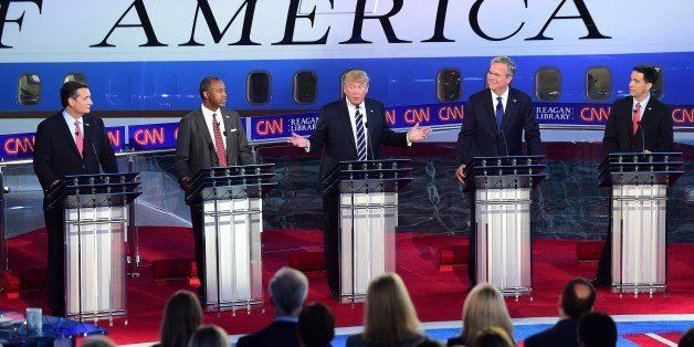 Republican presidential hopefuls, (L-R) Texas Sen. Ted Cruz, retired neurosurgeon Ben Carson, real estate magnate Donald Trump, former Florida Gov. Jeb Bush and Wisconsin Gov. Scott Walker participate in the Republican presidential debate at the Ronald Reagan Presidential Library in Simi Valley, California on September 16, 2015. Republican presidential frontrunner Donald Trump stepped into a campaign hornet's nest as his rivals collectively turned their sights on the billionaire in the party's second debate of the 2016 presidential race. AFP PHOTO / FREDERIC J. BROWN (Photo credit should read FREDERIC J BROWN/AFP/Getty Images)