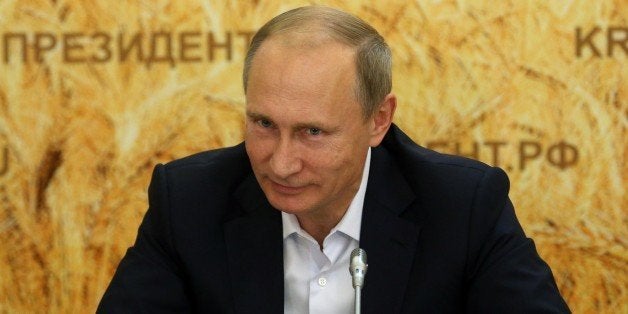 SEMIKARAKORSK, RUSSIA - SEPTEMBER 24: Russian President Vladimir Putin meets with farmers in a corn field September 24, 2015