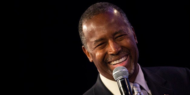 Ben Carson, 2016 Republican presidential candidate, smiles while speaking during the Values Voter Summit in Washington, D.C., U.S., on Friday, Sept. 25, 2015. The annual event, organized by the Family Research Council, gives presidential contenders a chance to address a conservative Christian audience in the crowded Republican primary contest. Photographer: Drew Angerer/Bloomberg via Getty Images 