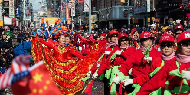 NEW YORK, NY - FEBRUARY 22: Revelers march in the Chinese New Year parade in Manhattan's Chinatown on February 22, 2015 in New York City. The parade, now in it's 16th year, brought out hundreds of participants and viewers to celebrate the Year of the Sheep. (Photo by Bryan Thomas/Getty Images)