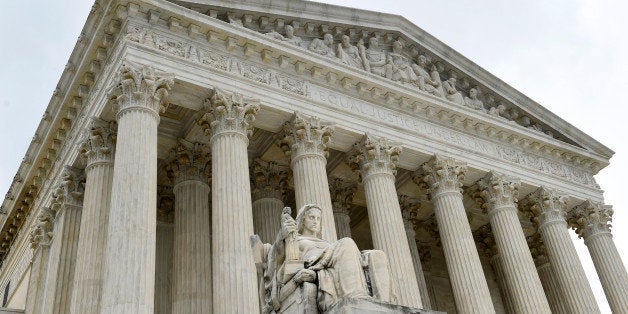 This photo taken Friday, Oct. 3, 2014, shows the U.S. Supreme Court in Washington. A Supreme Court term that is starting Monday, Oct. 6, 2014, with a lack of headline-grabbing cases may end with a blockbuster that helps define the legacy of the court under Chief Justice John Roberts. That's because the justices appear likely to take on the issue of same-sex marriage and decide once and for all whether gay and lesbian couples have a constitutional right to marry. (AP Photo/Susan Walsh)